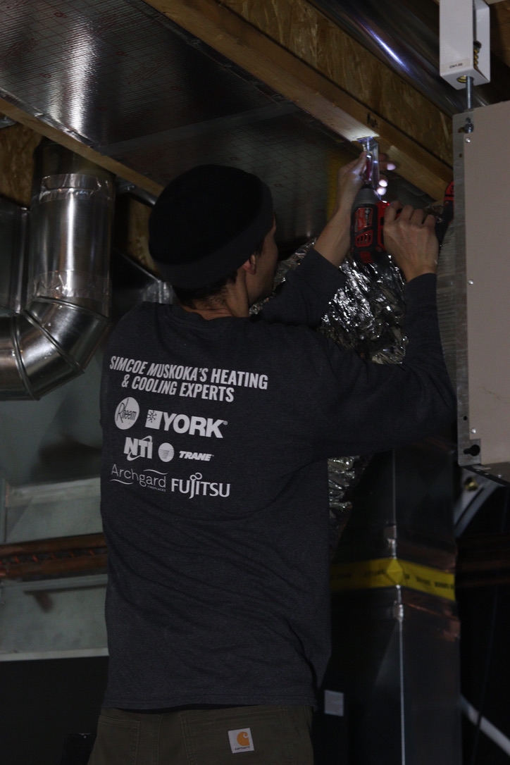 smhc worker fixing ac
